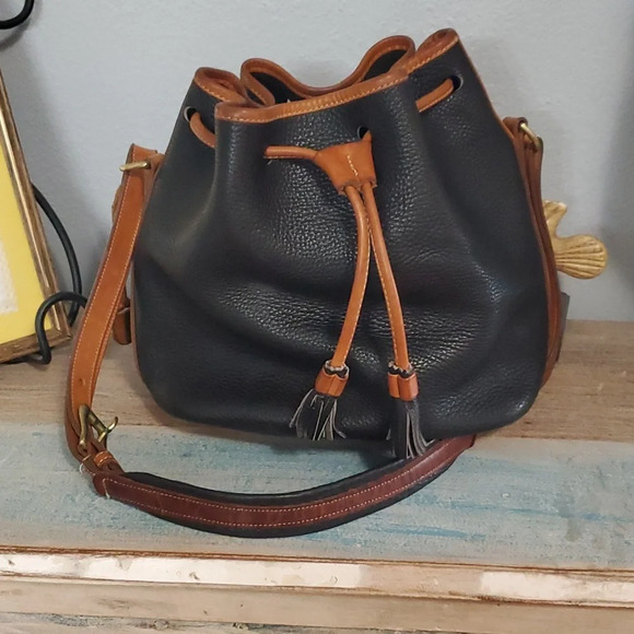 Dooney & Bourke Handbags - Dooney and Bourke Vintage drawstring pebbled black leather bucket bag